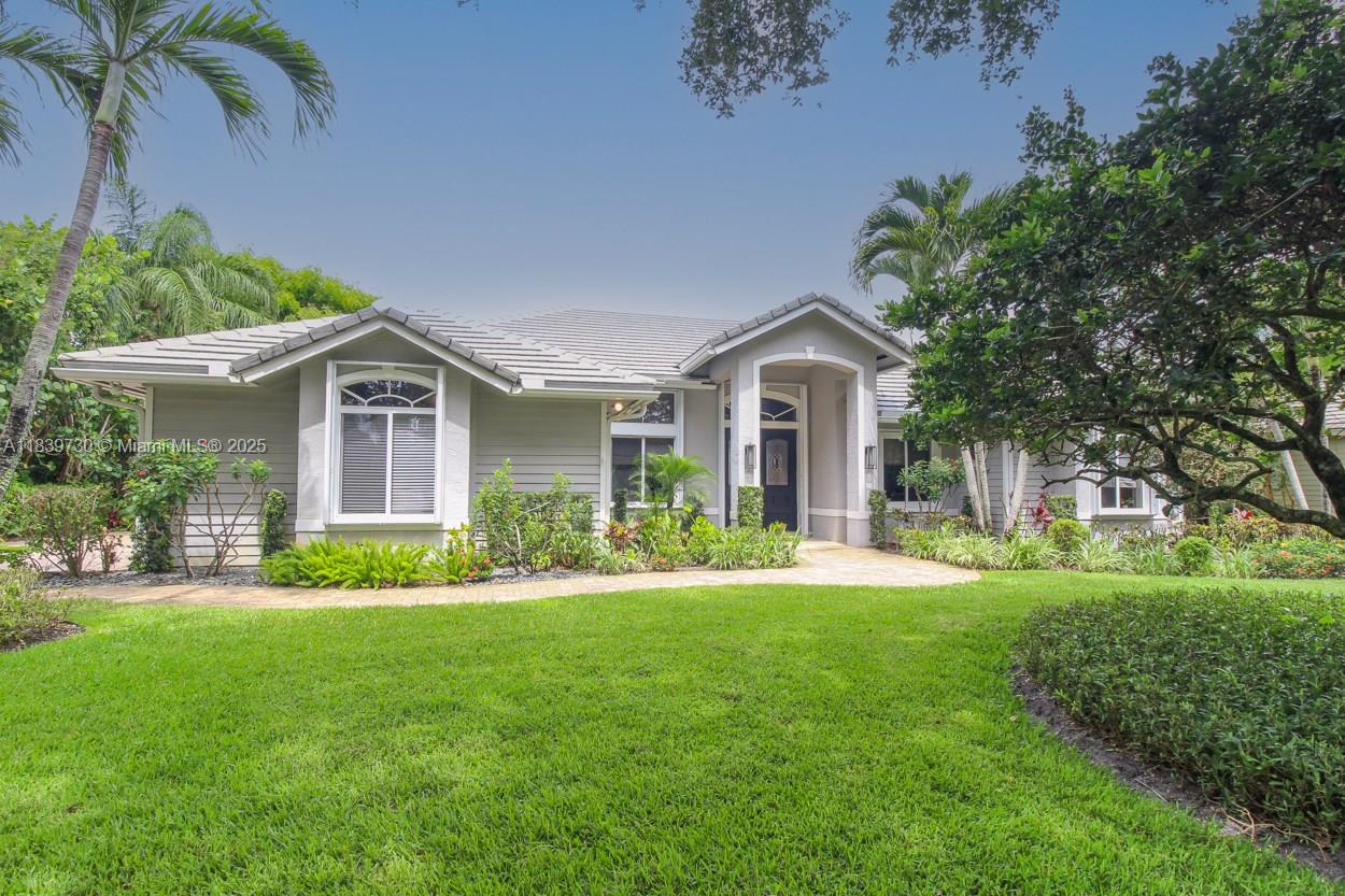 Welcome to 18650 SE River Ridge RD, Located in the coveted neighborhood of River Ridge. This meticulously maintained 3 Bed/2 Bath with office/den features CBS Construction with screened in pool, lake front home situated on .446 acres , 2 car garage with epoxy floors custom cabinets and is truly one of a kind for family/entertaining. Updated Kitchen with custom cabinets, granite countertops and stainless steel appliances. Split floor plan. Recent upgrades include : New 250-gallon propane tank in 2024, New Generator (house) 2023, New hot water heater 2024, New Roof in 2022 , New Sonos Amplifiers for interior Speakers 2023 , New A/C in 2021 and much more. Manicured landcaping with majestical oak trees and serene lake views, A Must See!