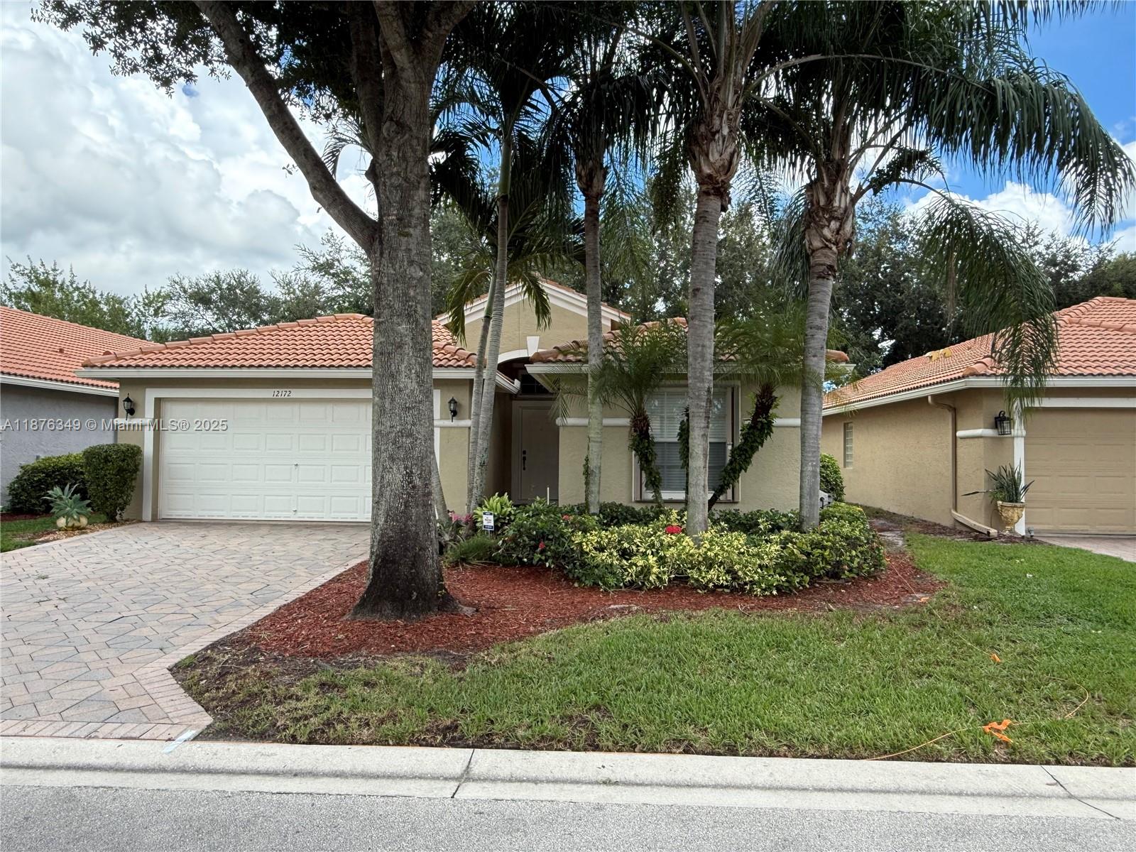 Welcome to this charming home featuring three spacious bedrooms, two bathrooms, and a 2-car garage. The open floor plan is perfect for entertaining and everyday living, with the kitchen flowing seamlessly into the living and dining areas. Hurricane accordion shutters provide peace of mind and protection in all weather. The home is in well-kept original condition, ready for your personal touch. Located in desirable Tuscany Bay, residents enjoy resort-style amenities and an active lifestyle, just minutes from world-class dining, shopping, and beaches. Don’t miss the opportunity to make this your private retreat.