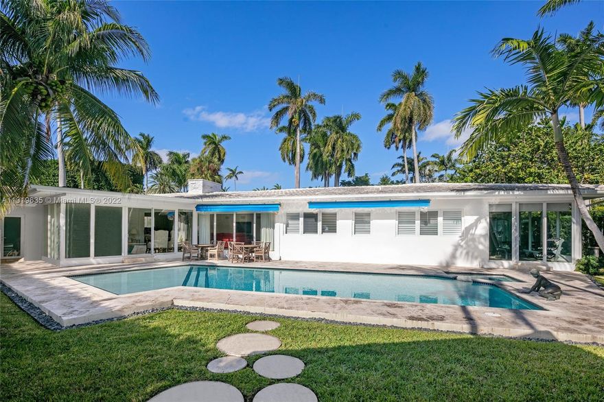 Enjoy living on private, guard-gated La Gorce Island in this contemporary one-story home situated on an 11,979 square foot corner lot. This residence boasts 4 bedrooms, 4 bathrooms, 1 half bath, an open floorplan, 3,121 total interior square feet of living, light-filled living spaces with natural light pouring through floor-to-ceiling windows wrapping the living and dining rooms and a gym. The outdoors are perfect entertaining or enjoying your oasis with a heated saltwater pool with a spa, bbq, outdoor shower and a cabana overlooking the pool. The home is complete with a 2 car garage and maid’s quarters. Located in close proximity to the beach, world-class restaurants & all that Miami Beach has to offer.