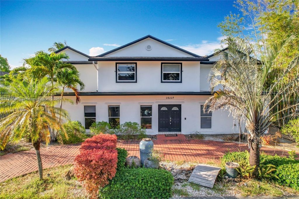 Photo of 10227 SW 53rd Ct, Cooper City, FL 33328 (MLS # A11798579)