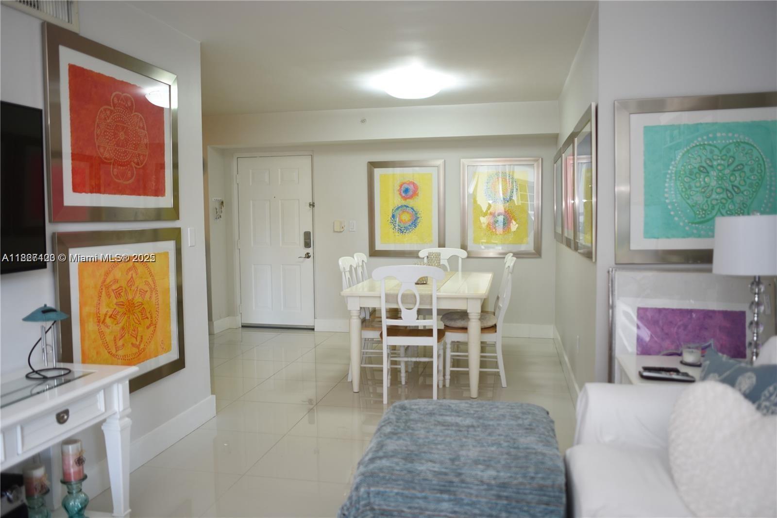 BEAUTIFUL CORNER 1/BED, 1/BATH GREAT LOCATION. Open layout integrating the beautiful designer remodeled kitchen with SS appliances, dining & living areas are leading into a large terrace with spectacular garden view. Porcelain floors throughout, large master & amazing master bath. Washer & dryer inside unit. Club house pool, sauna, tennis court, gym, racquetball, gated community. Current rented for $2,200. The location is great, the property is a few minutes walk to the Win Dixie supermarket, CVS, Doral City Place, strip shopping center with a variety of restaurants. Easy access to Turnpike, Palmetto Expressway & 836. Great investment opportunity.