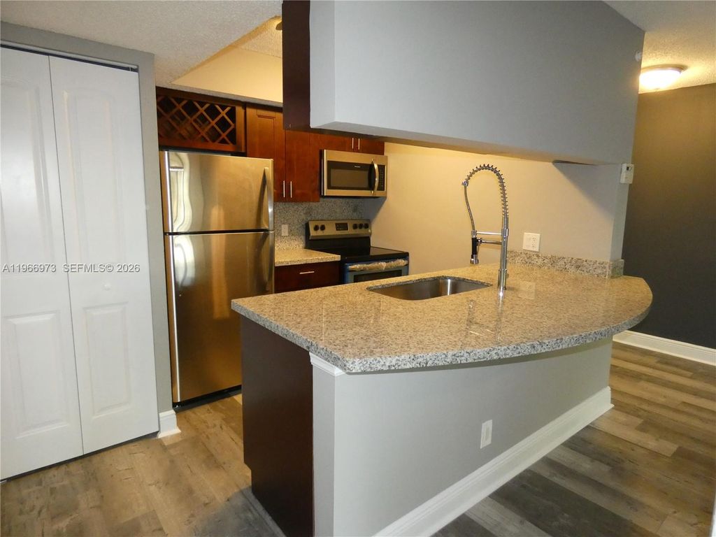 Photo of 5740 Rock Island Rd #291, Tamarac, FL 33319 (MLS # A11966973)