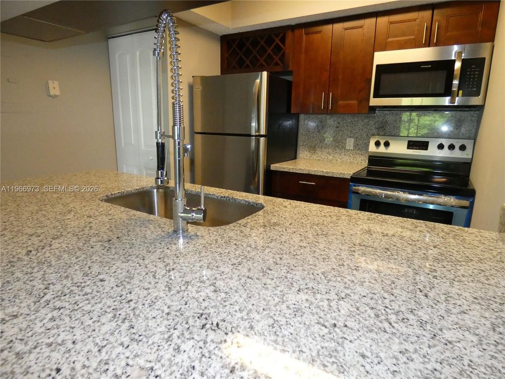 Photo of 5740 Rock Island Rd #291, Tamarac, FL 33319 (MLS # A11966973)