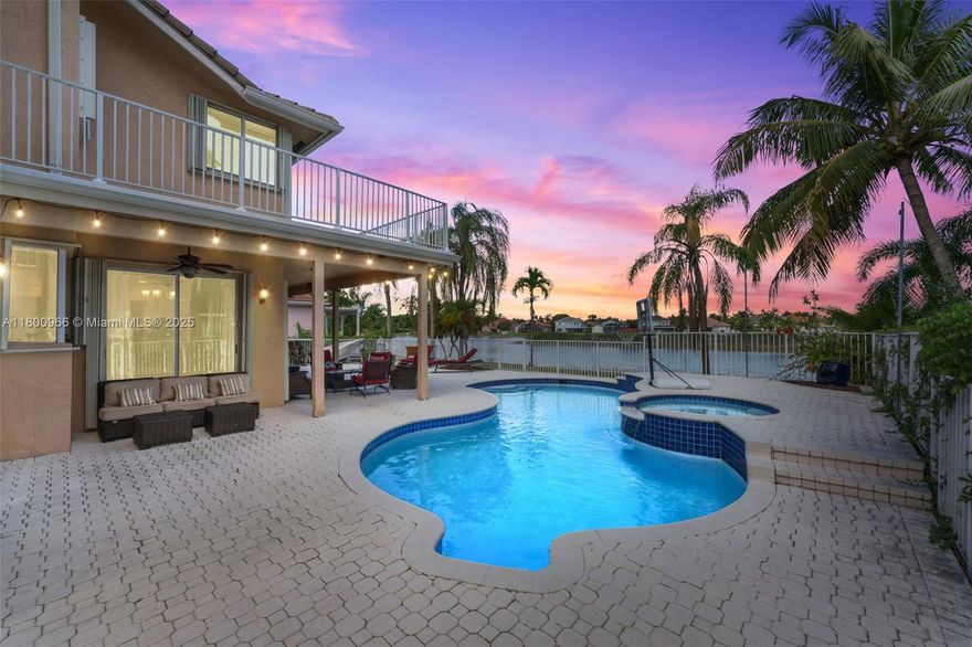 Step into comfort and style in this beautifully maintained 4-bed, 3.5-bath home with over 4,000 total sq. ft. in the sought-after Silver Lakes community of West Pembroke Pines, within the exclusive Enclave subdivision. Zoned for A-rated schools with nearby private and charter options. Includes downstairs guest suite with cabana bath. Backyard features pool, outdoor shower, and projector for movie or game nights under the stars. Enjoy lake views, stunning sunsets, and paddle-boarding access. Accordion shutters and security cameras offer peace of mind. Air-conditioned garage ideal for gym or workspace. Upstairs features a loft and 3 bedrooms, including a primary suite with balcony. Minutes from I-75, near top shopping, dining, and entertainment in one of Pembroke Pines’ safest communities.