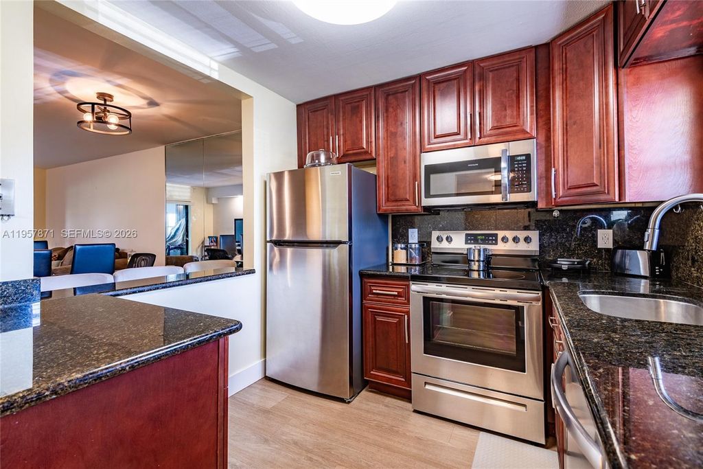 Photo of 9355 SW 8th St #105, Boca Raton, FL 33428 (MLS # A11957871)