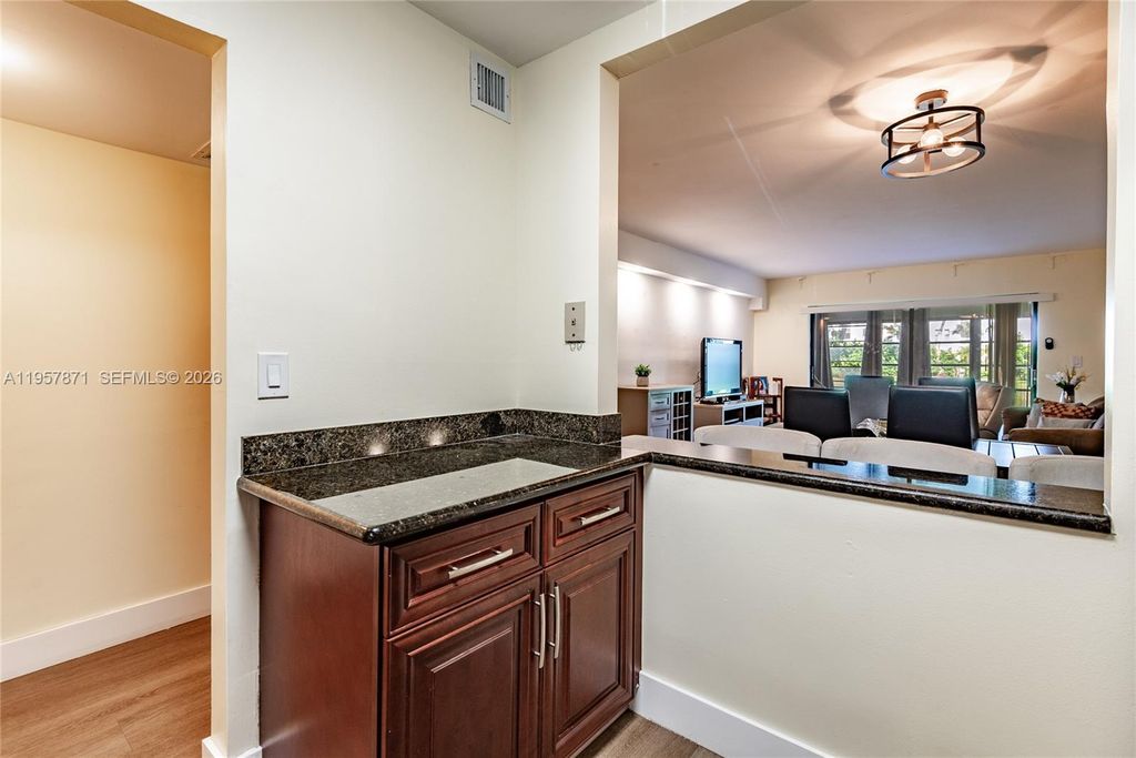 Photo of 9355 SW 8th St #105, Boca Raton, FL 33428 (MLS # A11957871)