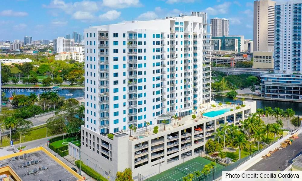 Experience breathtaking panoramic views from this stunning high-floor residence in the heart of Miami. This bright and airy loft-style 2-bedroom 2-bathroom condo boasts floor-to-ceiling windows, soaring ceilings, and an open-concept layout that blends modern design with industrial accents. The sleek kitchen features stainless steel appliances, quartz countertops, and ample storage. Enjoy spacious living and dining areas perfect for entertaining, plus a private balcony overlooking the skyline and Biscayne Bay. The primary bedroom offers serene water and city views, abundant natural light, and closet space. Located minutes from Brickell, Downtown, Wynwood, and Miami Beach, with resort-style amenities: pool, gym, spa, dog park, & more!- blending modern elegance with ultimate Miami Lifestyle!