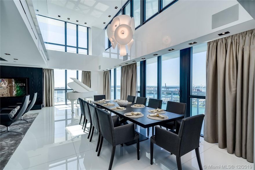 TOTALLY RENOVATED ONE OF THE KIND TWO STORY PENTHOUSE WITH SKYLINE MIAMI, STAR ISLAND AND OCEAN VIEWS. CUSTOM GLASS STAIRS, WET BAR, WINE ROOM, FOUR BEDROOMS WITH WALKING CLOSETS, POWDER ROOM AND OFFICE WITH FULLY INTEGRATED CRESTRON AND LUTRON SYSTEMS. MIELE AND SUBZERO APPLIANCES.