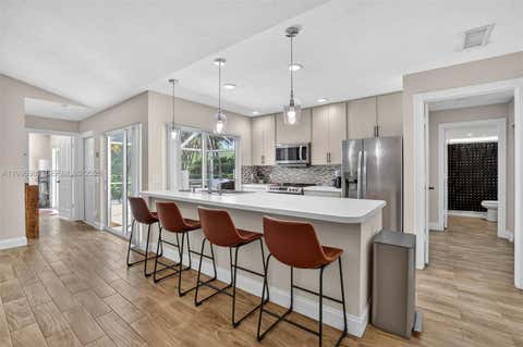 Photo of 102 Sun Terrace Ct, Palm Beach Gardens, FL 33403 (MLS # A11996981)