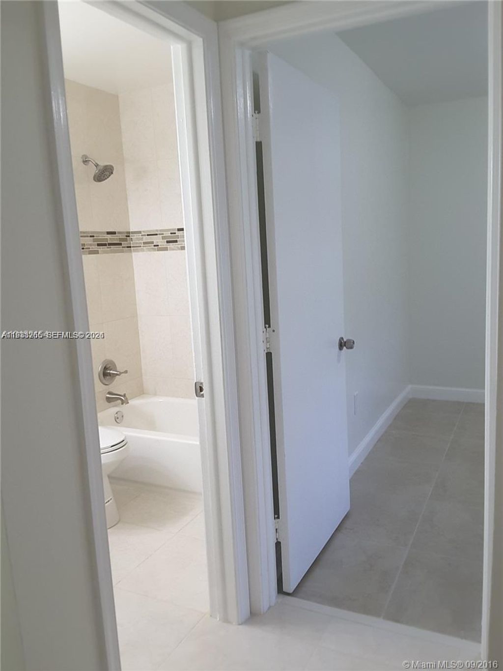 Photo of 6061 Shakerwood Cir #202, Tamarac, FL 33319 (MLS # A11938765)