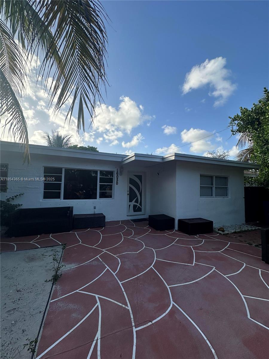 Beautiful Home in North Miami Beach Prime Location Near Sunny Isles & Aventura
Welcome to this charming North Miami Beach property, ideally located just 5 10 minutes from the stunning shores of Sunny Isles Beach and only 5 minutes from Aventura Mall. This home spacious inside and outside area and a brand-new roof, combining style and peace of mind.
Step outside to an extra-spacious backyard oasis, perfect for entertaining or relaxing with family. Enjoy the large tiki hut, a vibrant custom mural . The roundabout driveway offers ample parking and adds a grand touch to the home's entrance.
Families will appreciate the close proximity to Greynolds Park Elementary, making school drop-offs quick and easy.