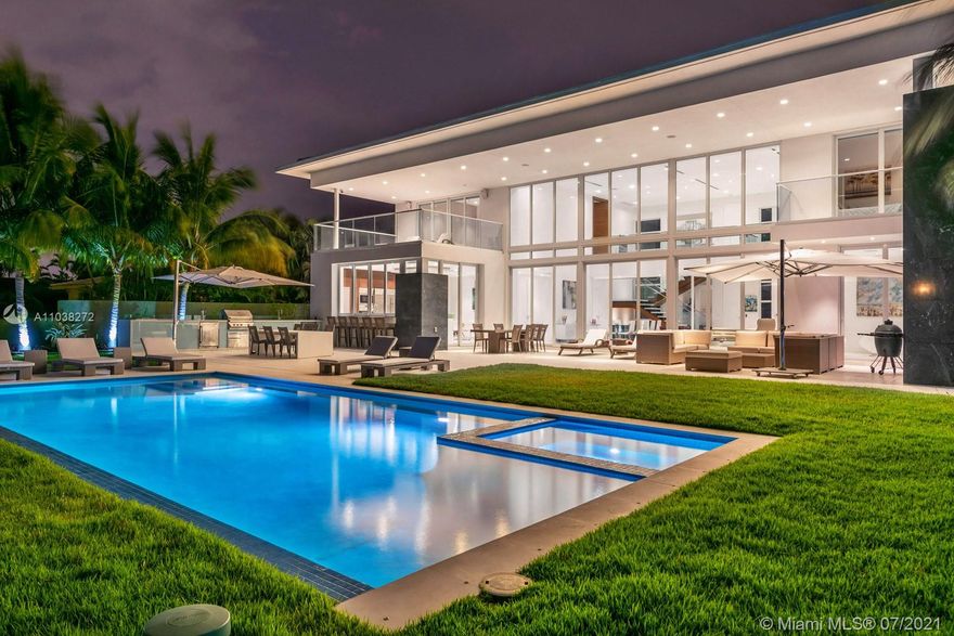 Contemporary waterfront estate in Golden Isles, one of South Florida’s most sought-after waterfront communities. Large lot (90’ x 150’), southern exposure, quiet cul-de-sac street, deep water, ocean access & no fixed bridges.  Deeded Dock for large vessel.  5BR/6BA, including a large master suite with private terrace, ideal for relaxation and entertaining. Bright and spacious living area allows for an enviable indoor-outdoor lifestyle, walls of glass lead to the lush backyard, pool area and summer kitchen.  The home is superbly equipped with a gourmet kitchen, bar and open dining area. Nearby restaurants, shops, beach and more, a must see.
