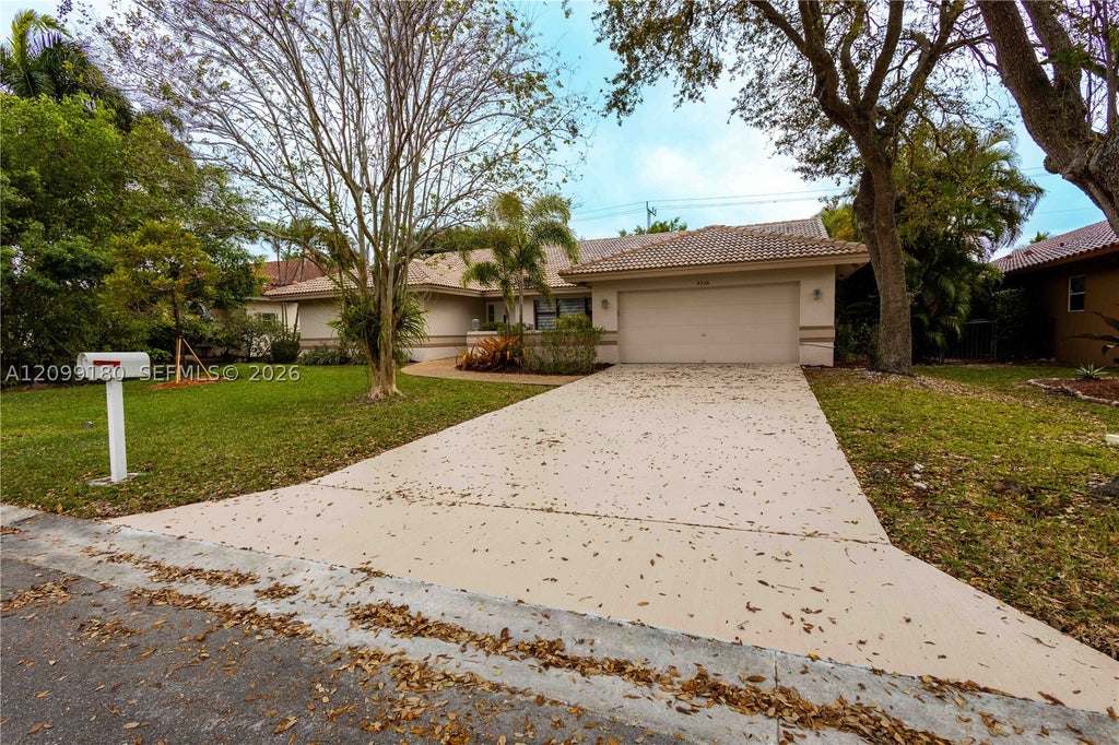 Photo of 8248 NW 40th Ct, Coral Springs, FL 33065 (MLS # A12099180)