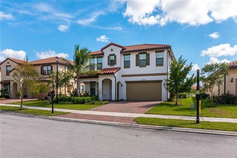 Photo of 11170 NW 82nd Pl, Parkland, FL 33076 (MLS # A12010762)
