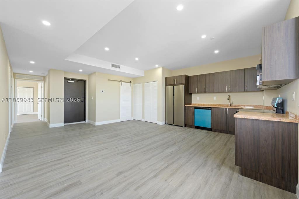 Photo of 1020 NW 2 Ave #401, Hallandale Beach, FL 33009 (MLS # A12059943)