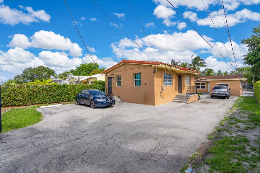 Excellent income-producing opportunity featuring two fully detached units on a spacious lot with separate parking and private layouts. Front unit is a large 2BD/1BA offering a full kitchen, living room, dining area, oversized bedrooms, and dedicated parking. Rear detached structure is configured as a 4BD/2BA and currently operated as a 3BD/1BA plus separate efficiency for additional rental income potential. Rear main unit includes full kitchen, living/dining areas, and separate parking from the efficiency. Large lot comfortably accommodates multiple vehicles. Prime location near the Citadel, Design District, major highways, shopping, dining, and entertainment. Ideal for investors or owner-occupants seeking strong income potential. 3D tour available.