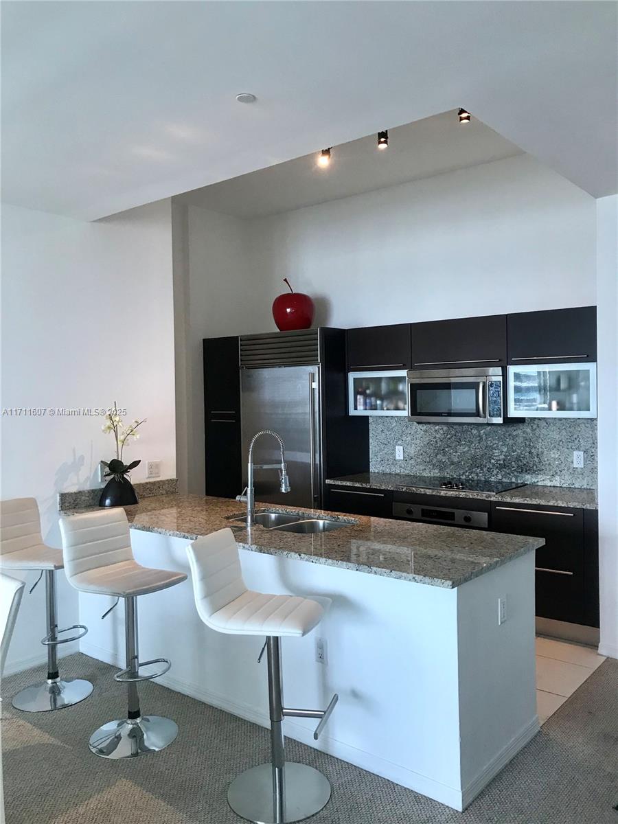 THE PLAZA 901 BRICKELL - Residential Lease