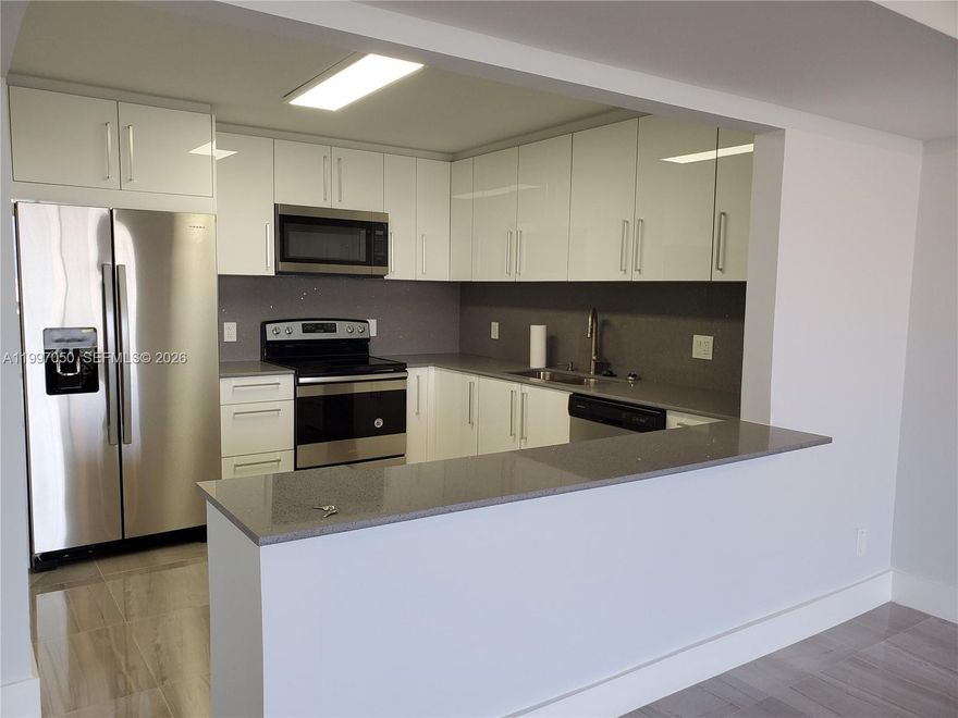 Enjoy resort style luxury Lovely 11th floor condo at Sailboat Cay Condo. UNIT Completely Remodeled w/ updated Kitchen and Bathrooms. Beautiful and spacious 2 bedrooms, 2 bathrooms, porcelain floors thru-out, with an open balcony. New Impact Hurricane Windows. All New Stainless Steel Appliances w/ Quartz counter-tops. New Thankless Water heater, NEW A/C. New Walk-in California closets. Great view of the city, boat docks. Nature preserve within walking distance, Starbucks, restaurant and other shopping centers. Minutes from F.I.U, and close to Aventura Mall, I-95 access and the beaches!! Short drive to the Beach! Great gated Community! Resort-style amenities include: 24 hr security, laundry facilities, covered two parking space.