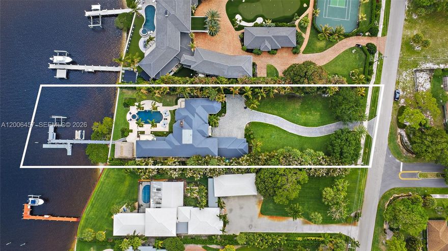 Set on nearly an acre along the river in the heart of Tequesta, this property was extensively renovated in 2024 by Turtle Beach Construction, blending clean, modern finishes with a layout designed around the water. Located in Anchorage Point, one of Tequesta's most desirable riverfront communities, and just moments from all the area has to offer, the setting combines privacy with convenience. A long, winding driveway leads to an expansive front yard, offering flexibility for future additions such as a guest house, garage, or expanded outdoor living. The interior is anchored by a well-planned primary wing positioned to take in wide water views, complemented by generous closet space, a dedicated exercise room, and a private outdoor shower with a calming, spa-like feel.

A first-floor guest suite provides a comfortable and private space for visitors. The setting lends itself to both relaxed living and entertaining, with ample room to create outdoor gathering areas or enhance the waterfront experience. Conveniently located near Tequesta's restaurants, shopping, and local amenities, this is a compelling opportunity to secure a renovated riverfront property!