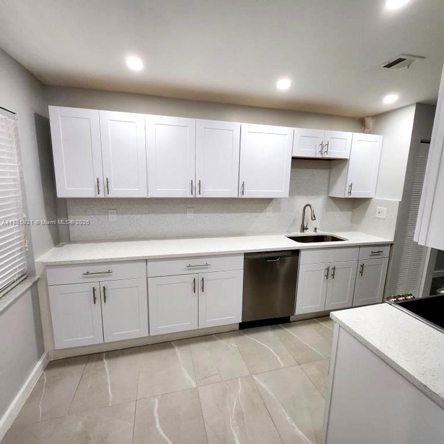 Perfect for Investors or those wanting to be an investor. This totally renovated 2BR/2BA ground floor/end unit with an excellent tenant in place @ $2100 monthly. This updated and renovated unit has new flooring, kitchen, vanities, and paint. Unit also has an in unit washer and dryer along with walk in closet in the en suite primary bedroom. The 2nd bedroom has a WIC with closet organizers. Quiet surroundings, but conveniently located by shops, restaurants, entertainment and services. Reasonable Association fees. No assessments currently planned.