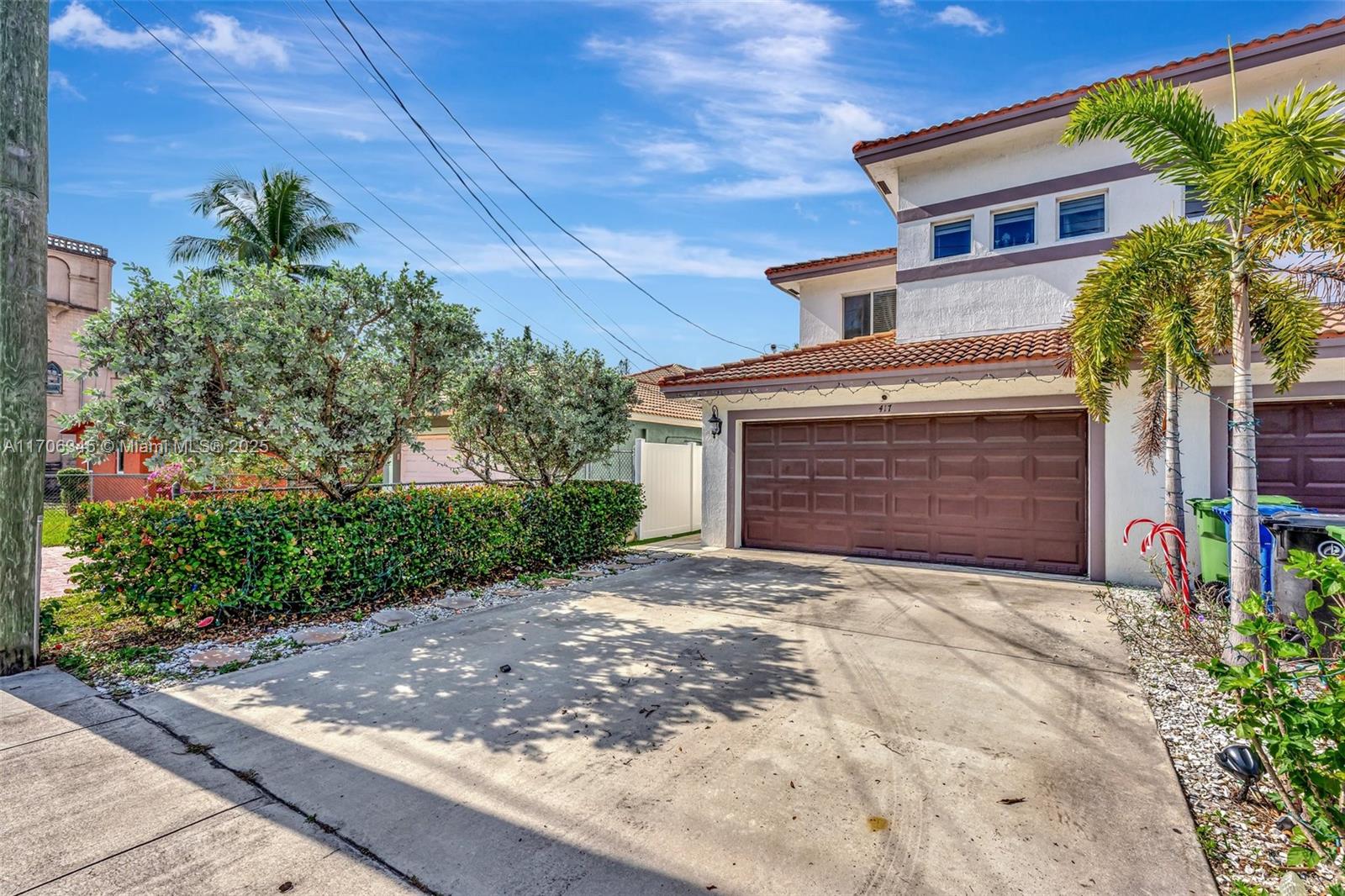 Welcome to 417 NW 9th Ave, a beautifully designed townhome in the heart of Fort Lauderdale! This 3-bedroom, 2.5-bath residence offers a modern, spacious layout perfect for living and entertaining. The updated kitchen features brand-new appliances, including a recently purchased refrigerator. The bright living space has been freshly painted and boasts stylish wood accent walls in the living and dining rooms. The garage has its own dedicated A/C system. Upstairs, Primary bedroom offering balcony access. The home includes a 2-car garage, driveway parking, and street parking. Just 5 minutes to Las Olas and 10 minutes to the beach!