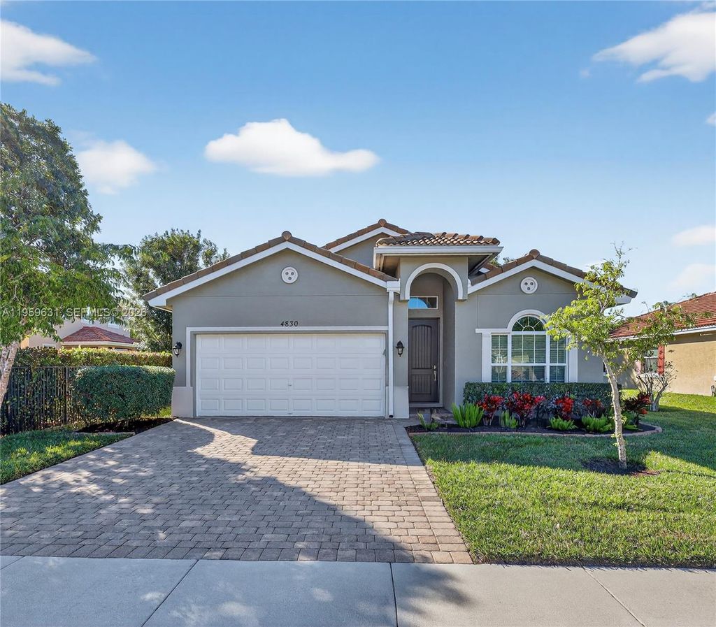 Photo of 4830 Foxtail Palm Ct, Green Acres, FL 33463 (MLS # A11959631)