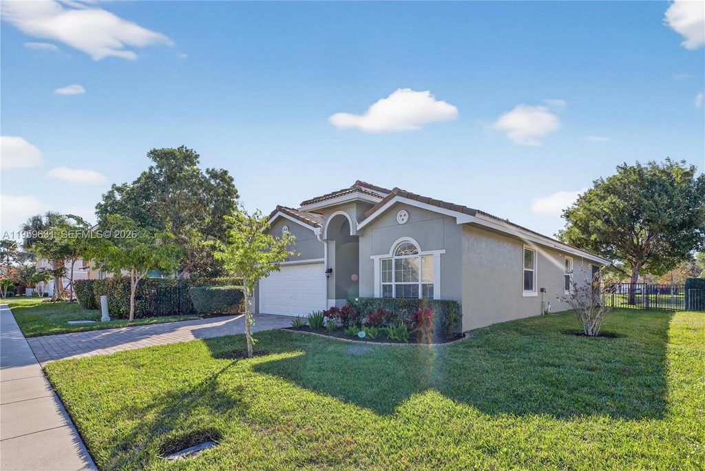 Photo of 4830 Foxtail Palm Ct, Green Acres, FL 33463 (MLS # A11959631)