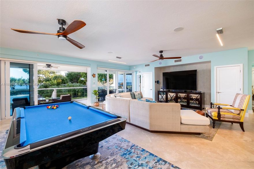 EXCLUSIVE FIVE-BEDROOM FLAGSHIP! Hemingway's Hideaway is the ONLY five-bedroom unit in Mariners Club and its luxury flagship rental. Already at $125K gross income YTD, it's on track to surpass $200K in its first full year—delivering impressive wealth-building returns. The estate boasts three king suites, a themed children's room, a private gym convertible to a fifth bedroom, and a fully remodeled interior with a custom tackle room, designer furnishings, brand-new HVAC, appliances, artwork, linens, and glassware. Florida licensed brokers are willing to stay on as managers and transfer 35 five-star VRBO reviews, providing instant credibility and marketing momentum. This rare, high-performing gem commands premium rates and is unmatched in the community!