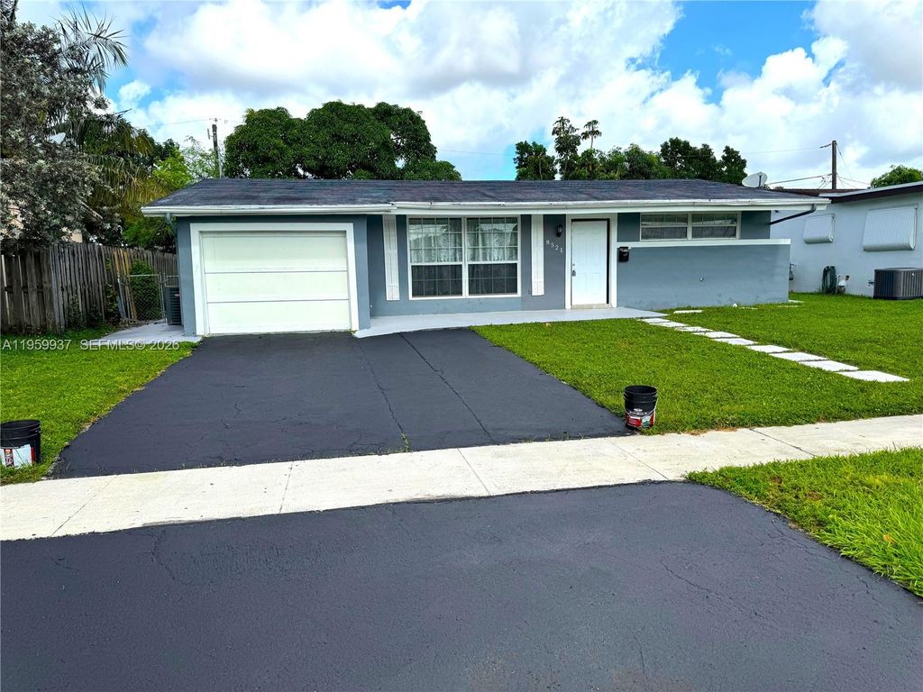 Photo of 8521 NW 25th Ct, Sunrise, FL 33322 (MLS # A11959937)