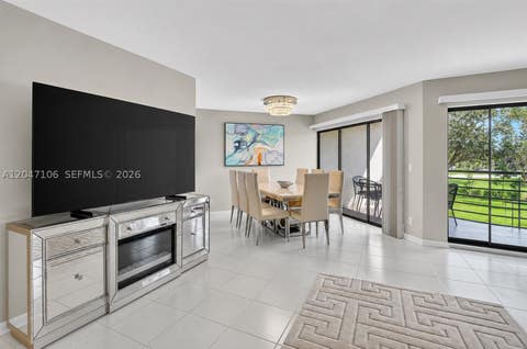 Photo of 5901 Camino Del Sol #207, Boca Raton, FL 33433 (MLS # A12047106)
