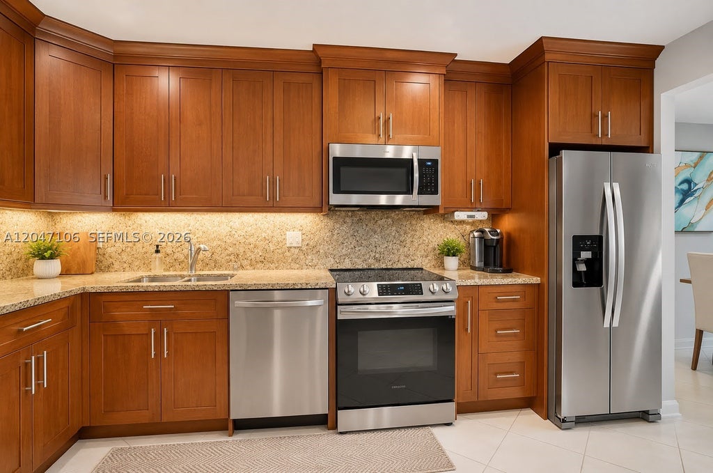 Photo of 5901 Camino Del Sol #207, Boca Raton, FL 33433 (MLS # A12047106)