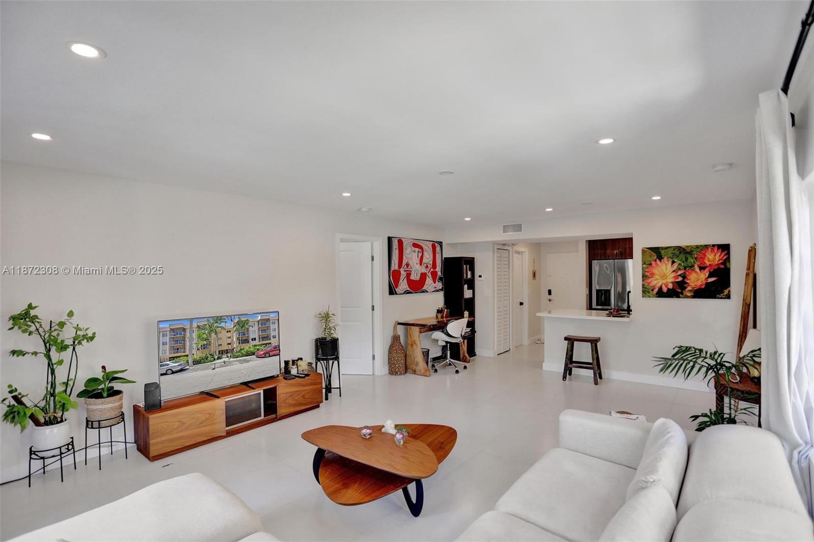 Renovated 2/2 w/no detail spared-nearly 1,300 SF located in the waterfront complex of Keystone Bay. Features include open kitchen w/snack bar, quartz counters, Euro style cabinets/stainless steel appliances including built-in air fryer stove. Lg living area leading to screened-in balcony overlooking lush nature preserve-ideal for running/hiking/biking. Porcelain flrs throughout & recessed LED lighting lends itself to a bright & airy look combined w calm & tranquility, truly makes this unit a true sanctuary! Master bdrm w/lg walk-in closet w organizers + 2 more closets, updated bthrm w double sinks. WASHER/DRYER in unit, impact windows/slider. Unit comes w 2/covered/gated & assigned pkg spaces. Pool overlooks water & Keystone Pt. Close to restaurants, shopping, schools/universities.