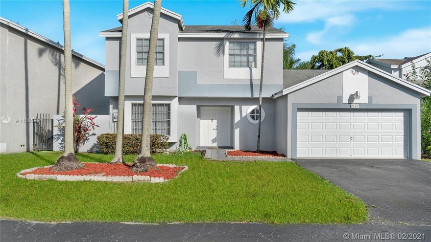 Location is key. Centrally located in the heart of the Hammocks, this home offers 3 bedrooms, 2 1/2 bathrooms and a large 2 car garage. Featuring a large kitchen overlooking the backyard, a half bath downstairs, waterproof laminate grey flooring throughout the home, oversized master bedroom and plenty of closet space. Newly reconstructed backyard fence with huge yard for kids and pets. Ample space to build a pool. Near grocery stores, shopping and great schools. The neighborhood features a beautiful community pool and tennis courts for residents only.