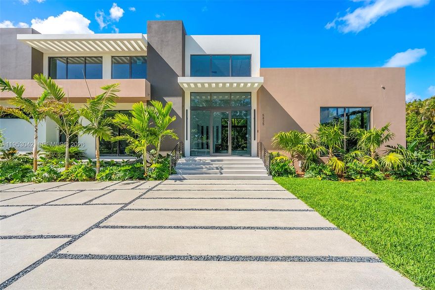 Nestled in the heart of Pinecrest, this brand-new construction residence sits on an expansive builder’s acre lot and features volume ceilings with floor-to-ceiling windows that flood the open-concept interiors with natural light. Designed for both everyday living and entertaining, the home offers 6 bedrooms and 7.5 bathrooms, formal dining, and a thoughtfully appointed wet bar. The kitchen is equipped with subzero and wolf appliances, Italian cabinetry, and custom built-ins. Additional highlights include a flexible room with en-suite bath, guest accommodations, cabana bath, elevator, concrete roof, three-car garage, covered terraces, and a summer kitchen is seamlessly integrated with the outdoor living areas and pool.