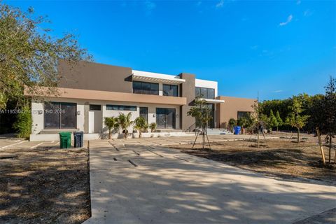 Photo of 5825 SW 111th Ter, Pinecrest, FL 33156 (MLS # A11953042)