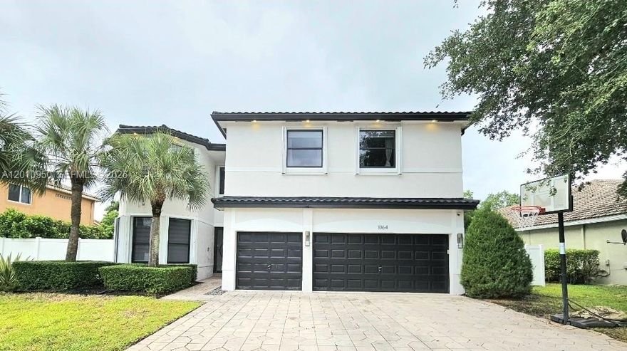 BEAUTIFUL HOME 6BD/4BA in gated community of The Estates of Pembroke Shores! This spacious residence features a beautifully updated first floor with elegant porcelain flooring and a fully remodeled modern kitchen quartz countertops, stainless steel appliances, and sleek cabinetry. First floor has 1 bedroom/office and 1 full bathroom. Enjoy a private backyard with heated pool, jacuzzi, perfect for relaxing or entertaining.  Located near "A" schools, parks, shopping, and highways.