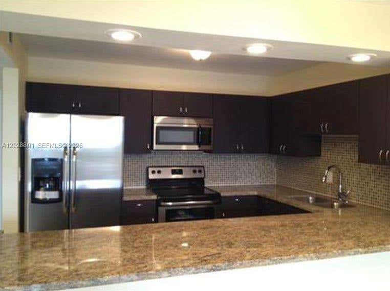 Photo of 2500 Parkview Dr #307, Hallandale Beach, FL 33009 (MLS # A12028801)