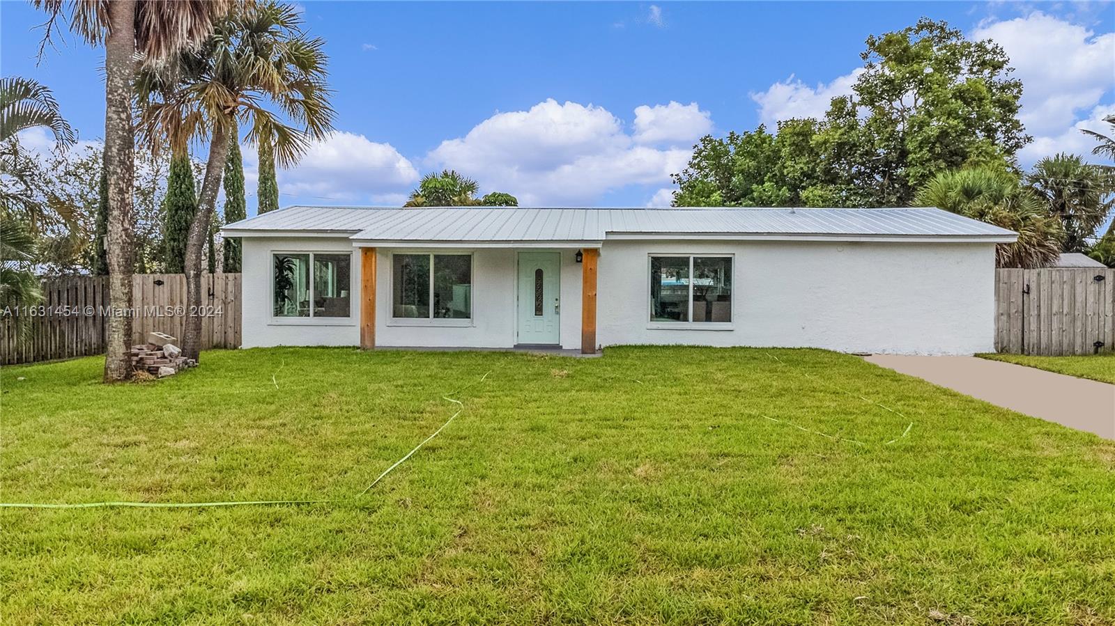 Exceptional Opportunity: Beautiful Home in Prime Jensen Beach Location
Discover this lovely residence situated in a highly desirable area of Jensen Beach, just minutes from the beach and a short drive to the Indian River. This spacious home features three bedrooms and two bathrooms, complemented by a thoughtfully designed open-concept kitchen that overlooks the inviting pool area. Large windows throughout the home provide abundant natural light, creating a warm and welcoming atmosphere. The property boasts a stunning pool and an expansive family patio, perfect for outdoor gatherings and relaxation. Additionally, the home comes equipped with new appliances for your convenience. Don’t miss out on this incredible opportunity to make this house your home!