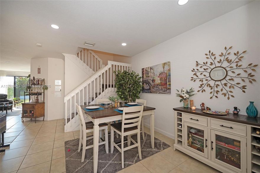 Stunning townhouse with lake view and 4bed/3bath with one garage in gated community, close to
shopping, turnpike and the Keys. One (1) bedroom and full bath downstairs and 3/2 upstairs. Fenced
back yard with beautiful viewing on lake.