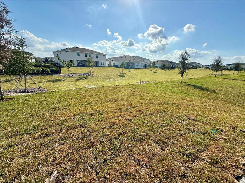 Photo of 19600 Whispering Creek Rd #19600, Loxahatchee, FL 33470 (MLS # A11923210)
