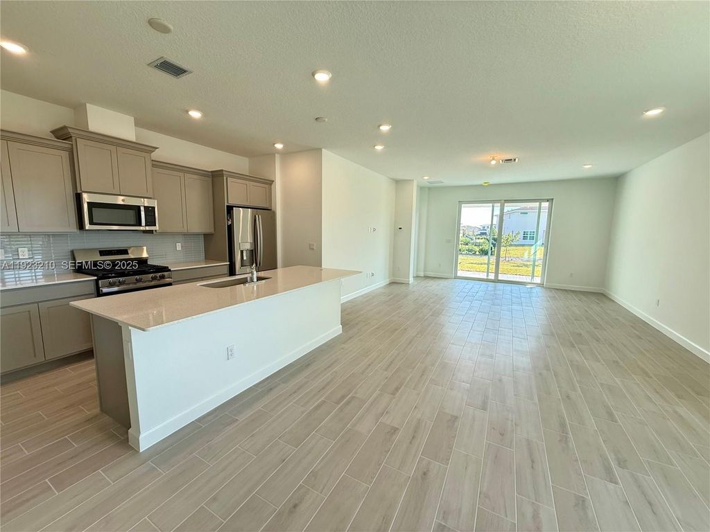 Photo of 19600 Whispering Creek Rd #19600, Loxahatchee, FL 33470 (MLS # A11923210)