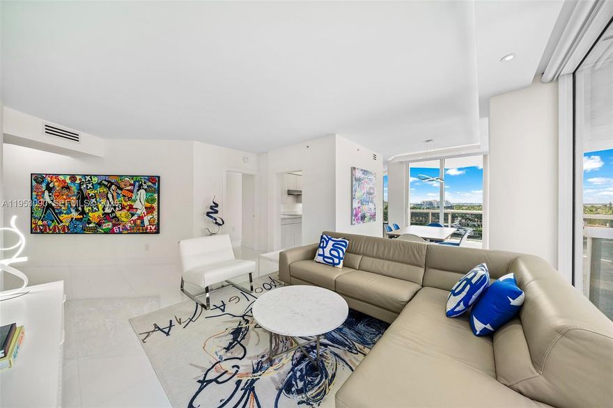 A wonderful opportunity to own in one of Miami Beach’s most sought-after oceanfront buildings. This light-filled corner residence offers a bright, open layout with beautiful city, bay, and ocean views. Crisp white porcelain flooring throughout enhances the clean, modern feel and reflects the abundant natural light.
The split floor plan features two bedrooms, including a spacious primary suite with a walk-in closet and a well-appointed bath with a jacuzzi tub and separate shower. Motorized smart shades throughout provide comfort and privacy.
Residents enjoy resort-style amenities, including an oceanfront pool, state-of-the-art fitness center, sauna, steam room, cold plunge, tennis courts, on-site cafe, and beach service.