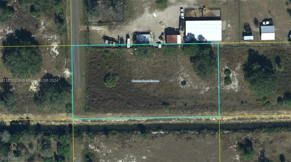 Outstanding 1.25 Arces corner lot around the area of South Montura Ranches. This lot is clear and ready for its new home. Horstall,mobile homes and Manufactured homes are allowed. Feel free to enjoy the freedom with your farm animals, children outdoor play toys. Lifestyle approximately 2 hrs in distance from City of Miami. No HOAS. Land has a survey. Great investment opportunity!! You’re must come to see it.