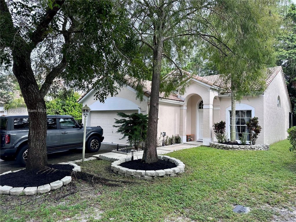 Photo of 3947 Jasmine Ln, Coral Springs, FL 33065 (MLS # A11858386)