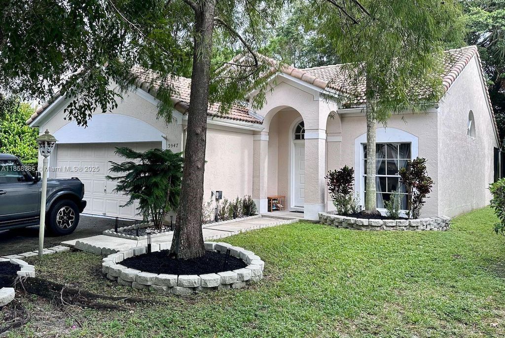 Photo of 3947 Jasmine Ln, Coral Springs, FL 33065 (MLS # A11858386)