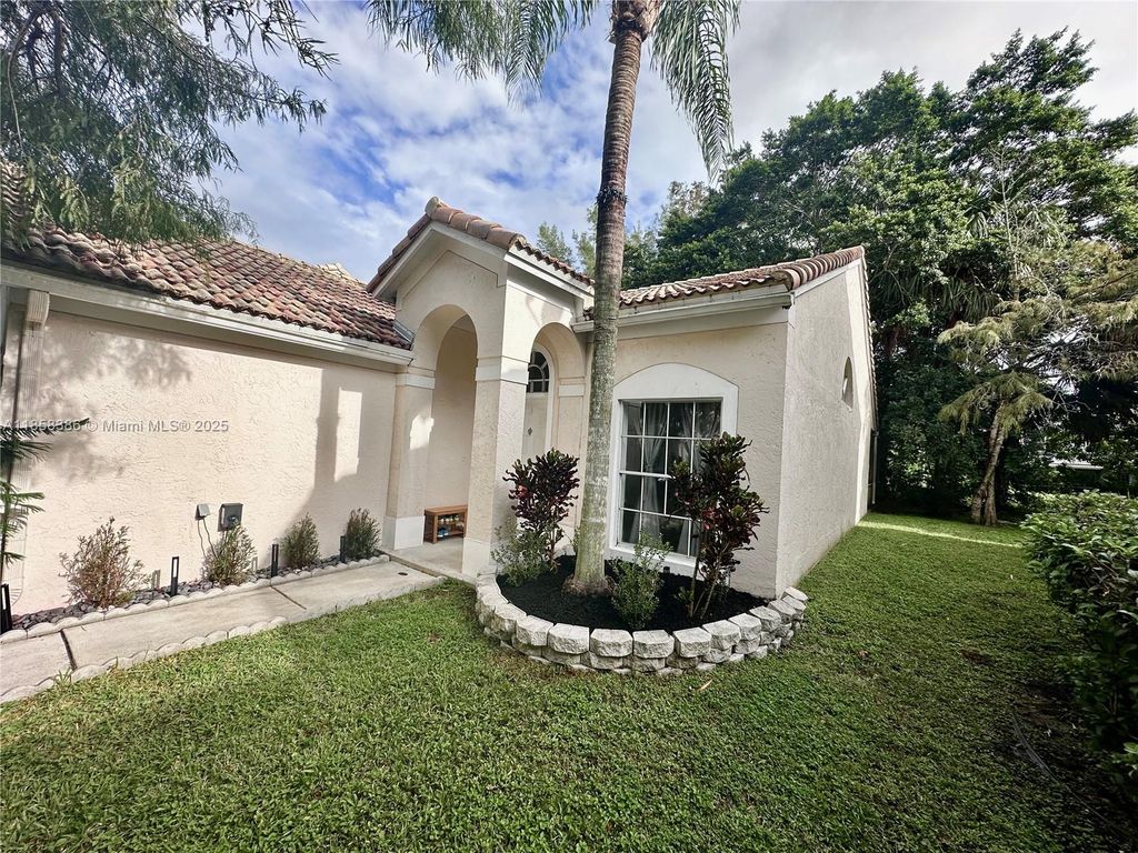 Photo of 3947 Jasmine Ln, Coral Springs, FL 33065 (MLS # A11858386)
