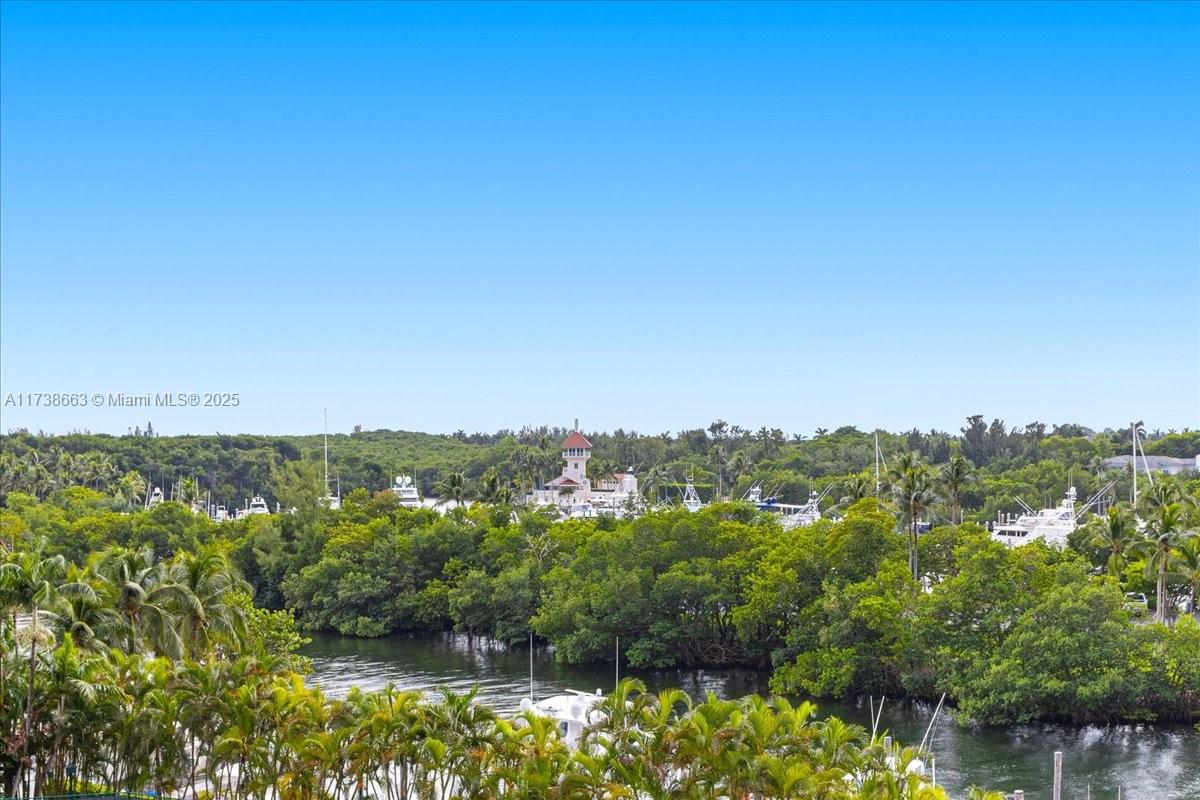 Discover a lifestyle that blends luxury, comfort and exclusivity in the sought-after Gables Club. This gorgeous and spacious 2,950 Sq. Ft. condo features 3 bedrooms and 3.5 bathrooms. Reach your haven via a private elevator and embrace the essence of Coral Gables. Enjoy the serenity of well-designed spaces, including an open floor plan with wood floors, a gourmet kitchen with Thermador appliances and an abundance of natural light. The bedrooms offer ample space with a balcony and stunning water views. Stellar amenities including tennis courts, a spa, gym, private restaurant, leisure and a lap pool, a putting green and a private marina. Take advantage of the excellent location near schools, restaurants, and shopping, and enjoy a lifestyle that truly encompasses the best of both worlds.