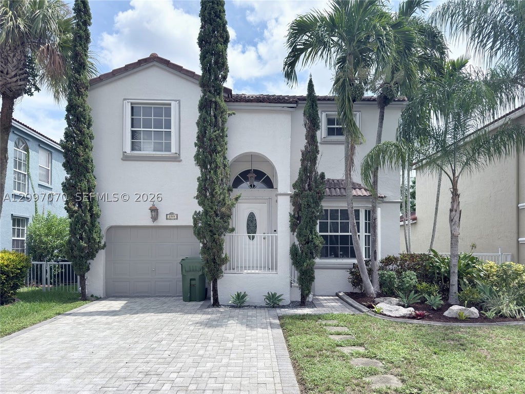 Photo of 199 NW 152nd Ave, Pembroke Pines, FL 33028 (MLS # A12097070)