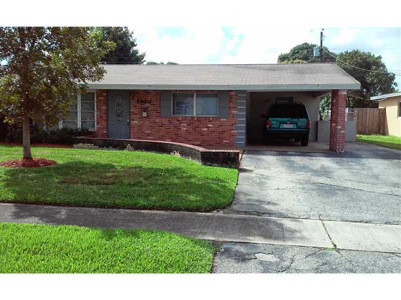 Back up the moving truck! This 3/2 split plan home has a separate dinning room, family room and laundry room. The kitchen and guest bath have been remodeled and all rooms have decorative blinds, drapes and hard wood floors. The front and back yards are well manicured. The storage shed is attached in the back of the house. 4 Vehicles fit comfortable for parking on the property. Newer A/C and roof. Owner financing may be available.