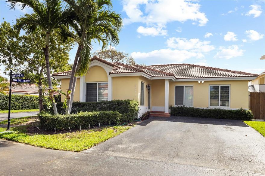 Step into elegance and comfort with this meticulously maintained, corner located single-story residence, featuring three spacious bedrooms, 2 bathrooms in the prestigious Doral Park community. Designed for those who value refined living, this charming home also comes equipped with impact windows. Enjoy exclusive access to a luxurious clubhouse offering a wide array of resort-style amenities: tennis courts, a sparkling swimming pool, a gourmet restaurant, elegant event spaces, a cutting-edge fitness center, rejuvenating sauna, and a vibrant children's playground. Nestled in the heart of Doral Park, this stunning property provides a unique opportunity to enjoy the best of upscale, family-friendly living. Don’t miss your chance to call this exceptional community home!